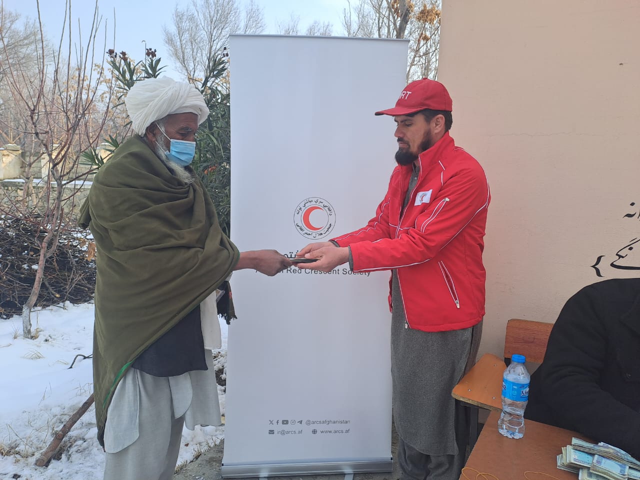 Cash Assistance Distributed to 13 Families Affected by Snowfall in Parwan
